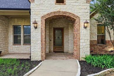 Nestled on a unique 1.79-acre homesite, this custom single-story - photo 3