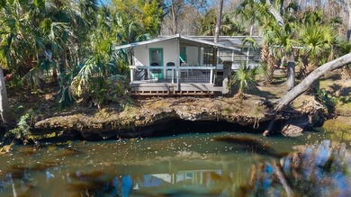 Experience timeless Old Florida charm with this rare waterfront - photo 1