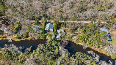 Experience timeless Old Florida charm with this rare waterfront - photo 3