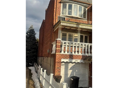 This Brick two family home in East Flatbush. This home is semi - photo 4