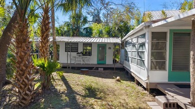 Experience timeless Old Florida charm with this rare waterfront - photo 4