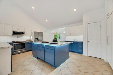 Nestled in the highly sought-after Tiana Shores enclave of - photo 9