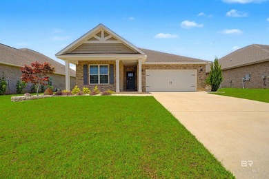 Welcome home! This like-new 4BR/2BA Gold Fortified brick home in - photo 1