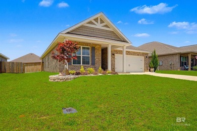 Welcome home! This like-new 4BR/2BA Gold Fortified brick home in - photo 2