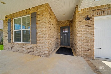Welcome home! This like-new 4BR/2BA Gold Fortified brick home in - photo 3
