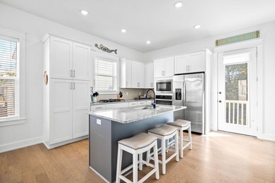 Sleeping up to 10 guests, 62 Charming Way offers two bedrooms - photo 7