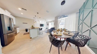 Elegantly furnished, this 4-bedroom, 3-bathroom townhouse with a - photo 3