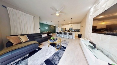 Elegantly furnished, this 4-bedroom, 3-bathroom townhouse with a - photo 8