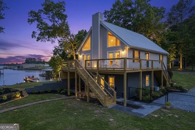 Experience lakefront living at its finest in this spacious - photo 1