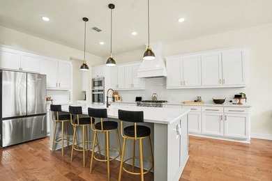 Luxury living meets lakeside community in this stunning - photo 11