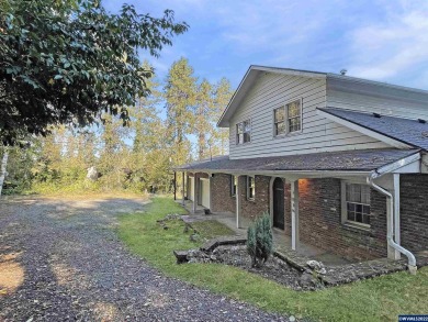 This beautiful acreage has views, pond, and treed setting with