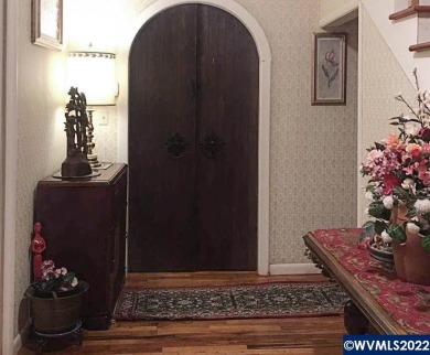 This beautiful acreage has views, pond, and treed setting with