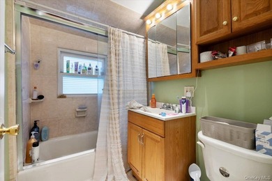 Expanded and rear-dormered Cape featuring 5 spacious bedrooms, 3 - photo 8