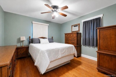 Expanded and rear-dormered Cape featuring 5 spacious bedrooms, 3 - photo 10