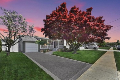 Beautifully maintained 3-bedroom, 2.5-bath ranch located in the - photo 1