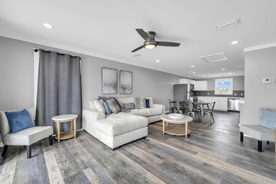 Directly across the street from the Gulf, this 2 bedroom, 2 - photo 3