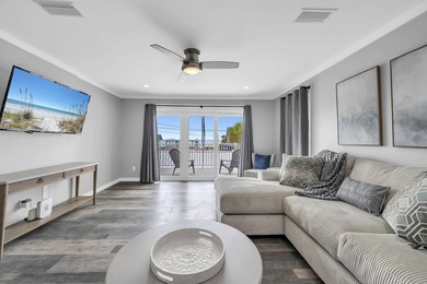 Directly across the street from the Gulf, this 2 bedroom, 2 - photo 4