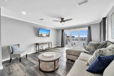 Directly across the street from the Gulf, this 2 bedroom, 2 - photo 6