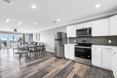 Directly across the street from the Gulf, this 2 bedroom, 2 - photo 8