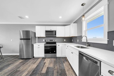 Directly across the street from the Gulf, this 2 bedroom, 2 - photo 9