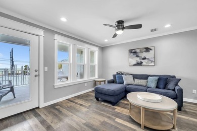 Directly across the street from the Gulf, this 2 bedroom, 2 - photo 4