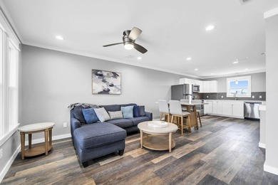 Directly across the street from the Gulf, this 2 bedroom, 2 - photo 5