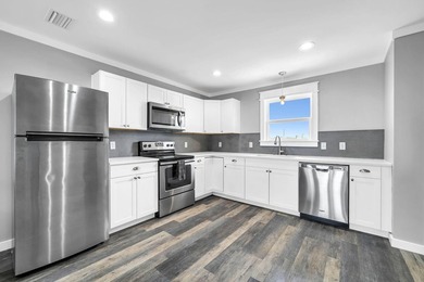 Directly across the street from the Gulf, this 2 bedroom, 2 - photo 8