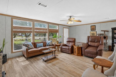 This move in ready 3-bedroom, 2-bath home offers an inviting - photo 3