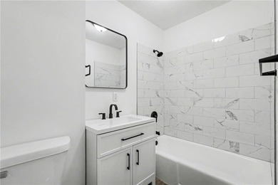 This beautifully updated 1.5-story interior-unit townhome blends - photo 13