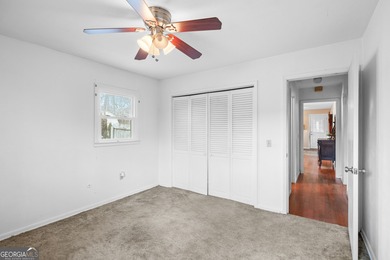 This four-sided brick, one-level home offers 3 bedrooms and 1.5