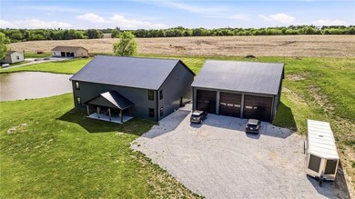 Tucked behind a grove of mature trees, this 4-bedroom - photo 11
