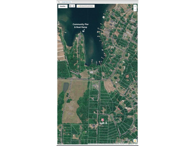 Beautiful wooded interior lot located in a LAKEFRONT COMMUNITY - photo 3