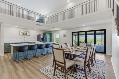 Tucked behind a grove of mature trees, this 4-bedroom - photo 17