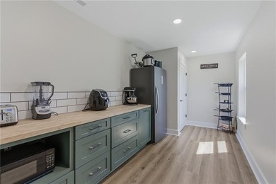 Tucked behind a grove of mature trees, this 4-bedroom - photo 21