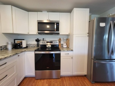 BEAUTIFUL RENOVATION IS TURNKEY AND INCLUDES GOLF CART! Just - photo 21