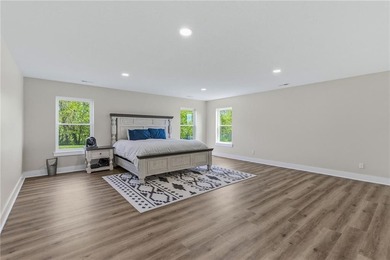 Tucked behind a grove of mature trees, this 4-bedroom - photo 22