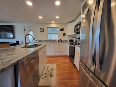 BEAUTIFUL RENOVATION IS TURNKEY AND INCLUDES GOLF CART! Just - photo 22