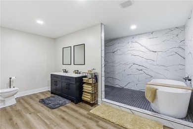 Tucked behind a grove of mature trees, this 4-bedroom - photo 24