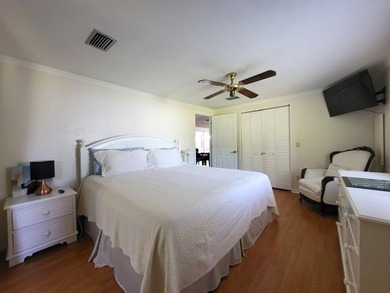 BEAUTIFUL RENOVATION IS TURNKEY AND INCLUDES GOLF CART! Just - photo 29