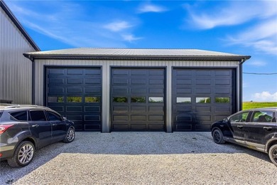 Tucked behind a grove of mature trees, this 4-bedroom - photo 33