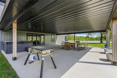 Tucked behind a grove of mature trees, this 4-bedroom - photo 44