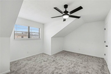 This beautifully updated 1.5-story interior-unit townhome blends - photo 15