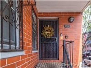 Updated three-bedroom duplex in the heart of Harlem, featuring - photo 3