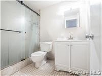 Updated three-bedroom duplex in the heart of Harlem, featuring - photo 9