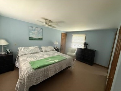 Located on Walloon Lakes' West arm, this property offers - photo 15