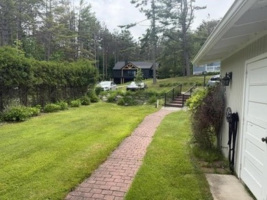 Located on Walloon Lakes' West arm, this property offers - photo 17