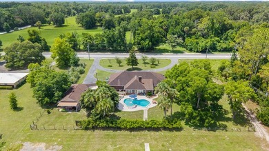 Spacious brick home with separate guest house, pool, and - photo 1