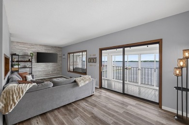 Waterfront living doesn't get much better than this beautifully - photo 3