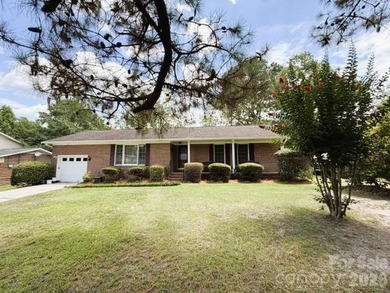 Welcome to this charming home tucked away on a spacious lot in - photo 2