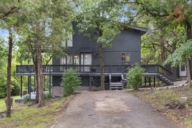 Tucked away at the end of a peaceful cul-de-sac, and nestled in - Lake Home For Sale in Hollister, Missouri